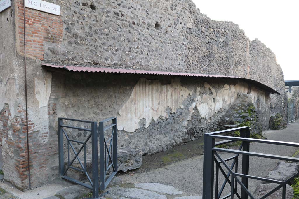 Pompeii Street Altar at I.8.1. December 2018. Looking towards Altar on east side of Vicolo dellEfebo. Photo courtesy of Aude Durand.