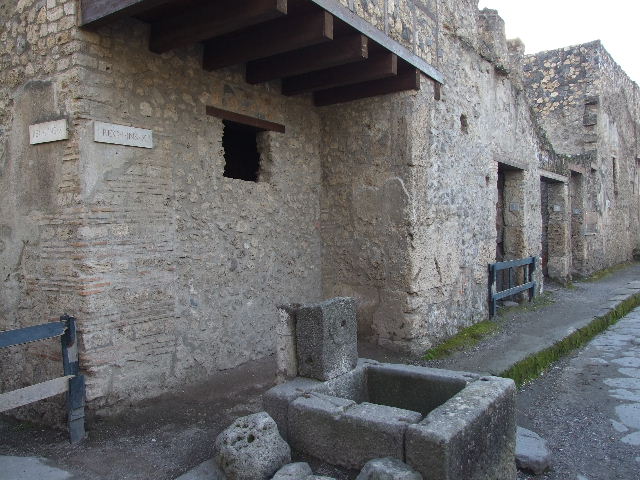 Public fountain with compitum at I.10.1 Pompeii. December 2007. Rear of fountain.