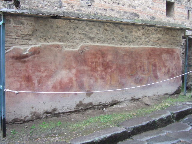 VII.11.13  Pompeii. December 2005. Painted street shrine on outside wall.   
