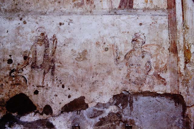 IX.11.1.   Detail of painted figure, perhaps one of the two Lares.   December 2006.