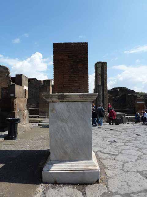 Arch of Marcus Holconius Rufus. September 2010. Detail of marble veneer on north-west pillar, south side. Photo courtesy of Drew Baker.