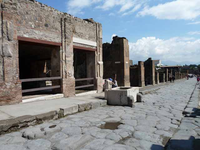 VII.9.67 Steps to rear of Eumachia’s Building showing  fountain and Vicolo di Eumachia, looking north. Old undated photograph courtesy of the Society of Antiquaries, Fox Collection.

