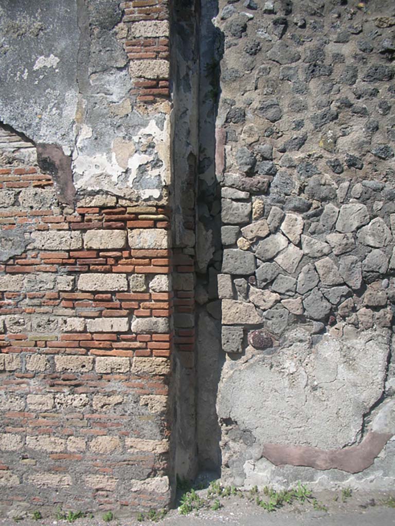 Porta Ercolano or Herculaneum Gate, Pompeii. May 2010. 
Detail from east side of gate at north end, area of “portcullis”. Photo courtesy of Ivo van der Graaff.
