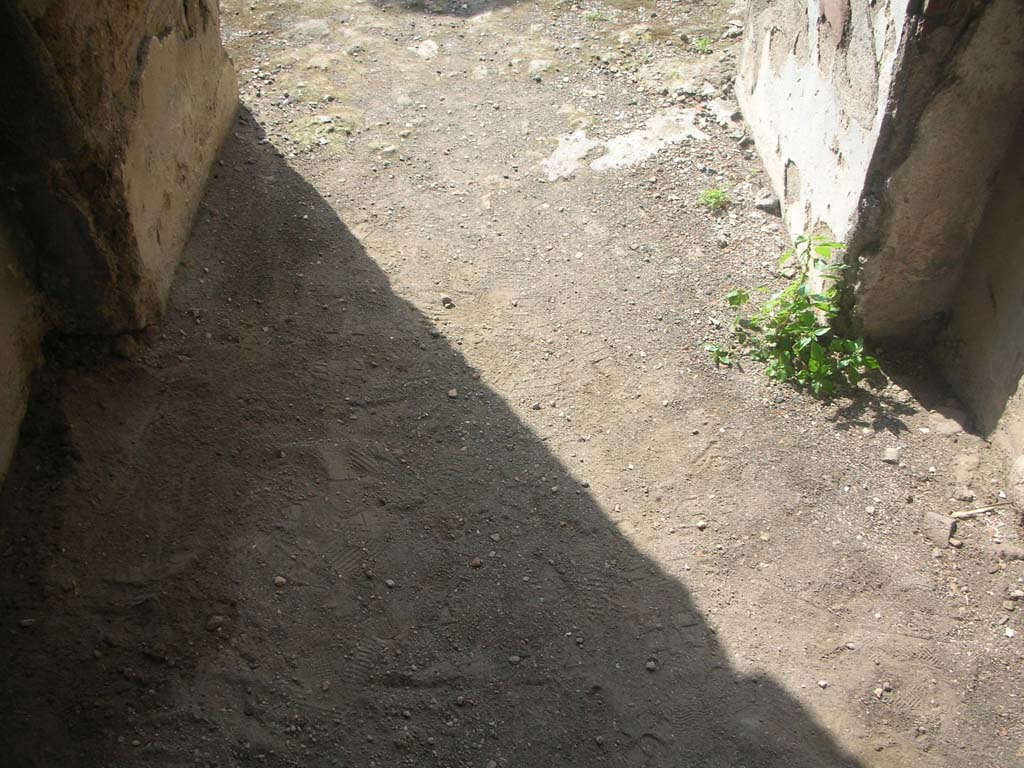 Porta Ercolano or Herculaneum Gate, Pompeii. May 2010. 
Flooring on north end of south side of east side of gate. Photo courtesy of Ivo van der Graaff.

