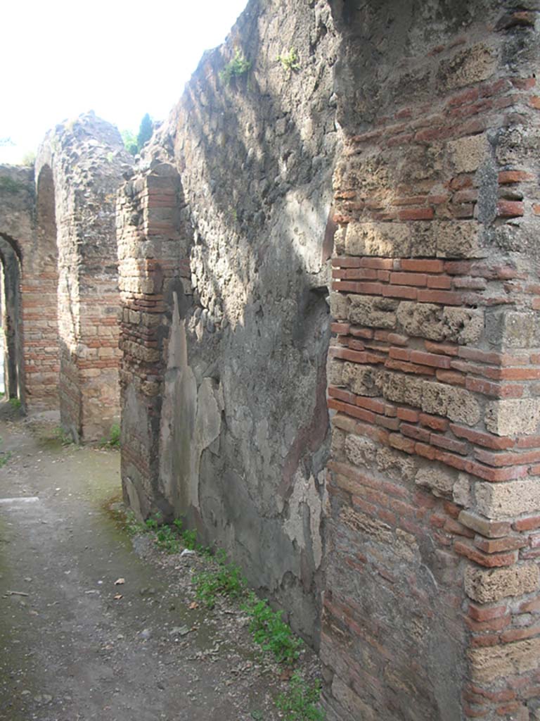 Porta Ercolano or Herculaneum Gate, Pompeii. May 2010.  
East side, looking south along west wall from north end. Photo courtesy of Ivo van der Graaff.
