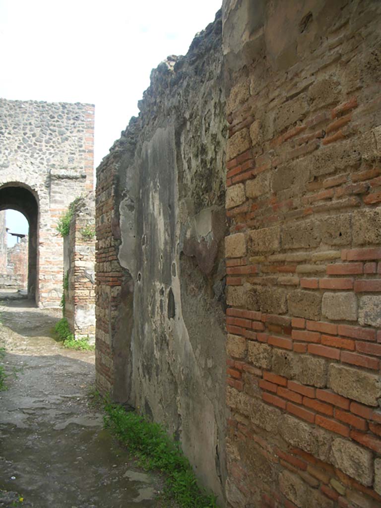 Porta Ercolano or Herculaneum Gate, Pompeii. May 2010. 
Looking south along west wall from north end on east side of gate. Photo courtesy of Ivo van der Graaff.
