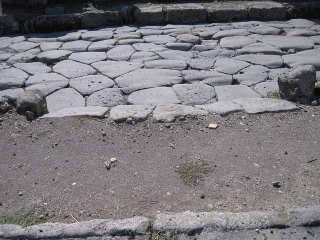 I.1.8 Pompeii. September 2010. North wall of small room, with doorway to large entrance room. Photo courtesy of Drew Baker.