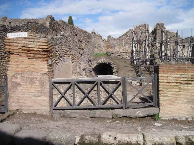 I.2.13 Pompeii. September 2010. Looking east across bar, from entrance.
Photo courtesy of Drew Baker.