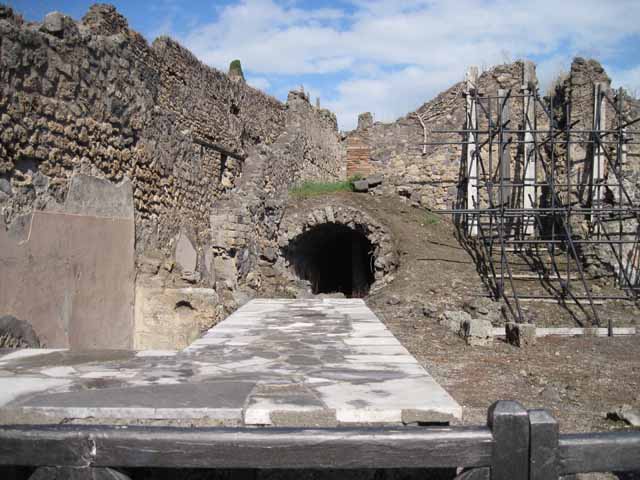 I.2.13 Pompeii. September 2010. On the left is the site of the small room.
On the right is the doorway of I.2.14, which would have had a staircase leading up to an independent property above. Photo courtesy of Drew Baker.