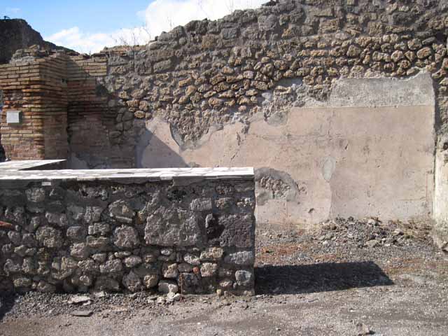 I.2.13 Pompeii. September 2005. The area at the front, right, of the picture corresponds to the rear room of both I.2.12 and I.2.13.