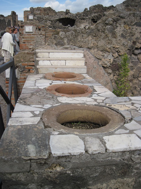 I.3.3 Pompeii. September 2010. Looking west over wall from I.3.3, into I.3.2 towards via Stabiana. Photo courtesy of Drew Baker.