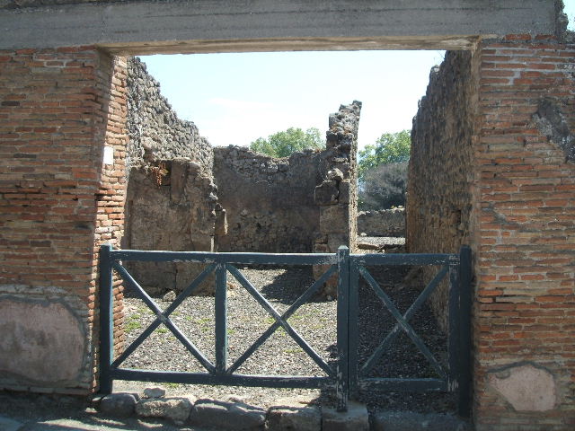 I.3.14 Pompeii. September 2010. Looking south along corridor, leading to narrow area linked to I.3.13. Photo courtesy of Drew Baker.

