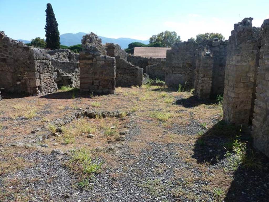 I.3.23 Pompeii. September 2015. Looking south across remains of impluvium in atrium.