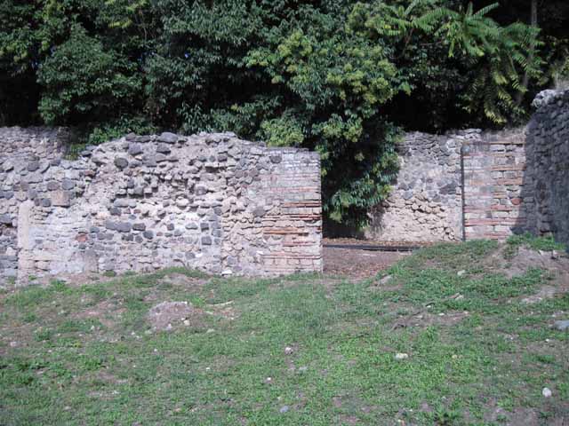 I.5.3 Pompeii. September 2010. Niche in west wall of large open area.
Photo courtesy of Drew Baker. Boyce reported that there was an arched niche in the west wall with projecting floor. See Boyce G. K., 1937. Corpus of the Lararia of Pompeii. Rome: MAAR 14. (p.25)