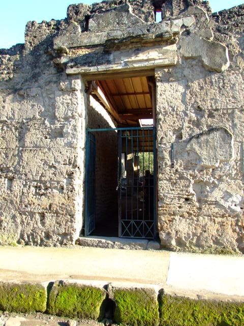 I.6.4 Pompeii. March 2009. Doorway to room 2, triclinium.