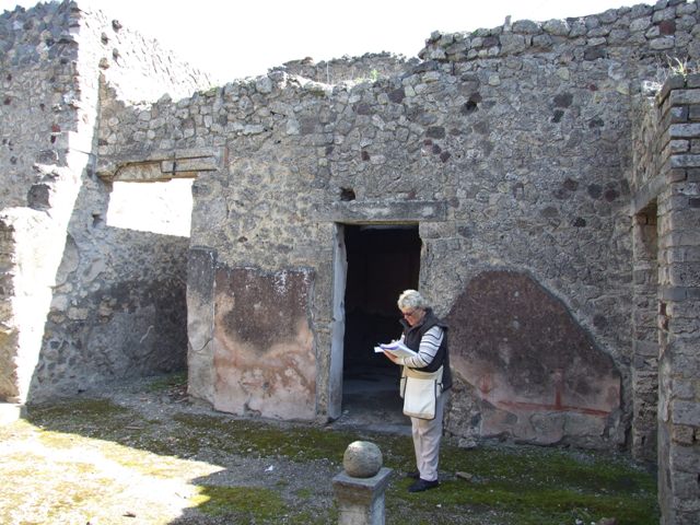 I.8.9 Pompeii. March 2010. Room 1, atrium, with restored impluvium. Looking north to room 2, oecus. Photo courtesy of Rick Bauer.