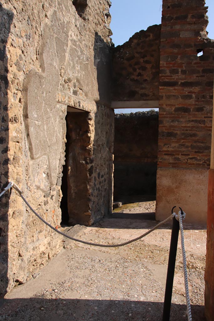 I.9.5 Pompeii. October 2022. 
Doorways to room 14 (left) and room 15 (ahead). Photo courtesy of Klaus Heese.
