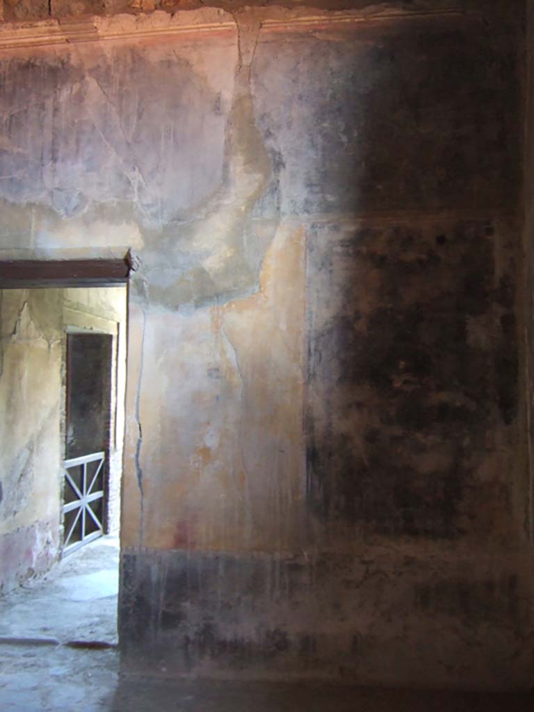 I.10.4 Pompeii. May 2006. Room 17, west wall, with doorway to corridor 16.