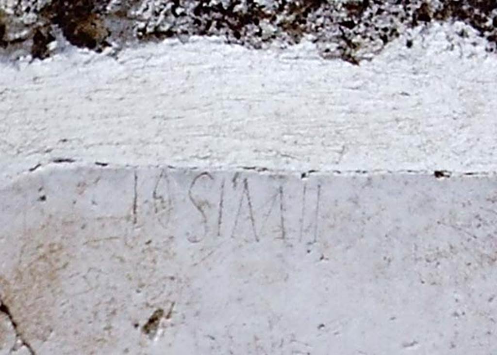 I.13.9 Pompeii. 1966. Inscription from plaster immediately south (left) of doorway. 
Detail from photo J66f0274 by Stanley A. Jashemski.  
According to Epigraphik-Datenbank Clauss/Slaby (See www.manfredclauss.de) this read
 
[Z]osime       [CIL IV 10072b]
See Varone A., 2012. Titulorum Graphio Exaratorum Qui In C.I.L. Vol. IV Collecti Sunt Imagines: Studi SAP 31. Roma: LErma di Bretschneider, p. 87.
