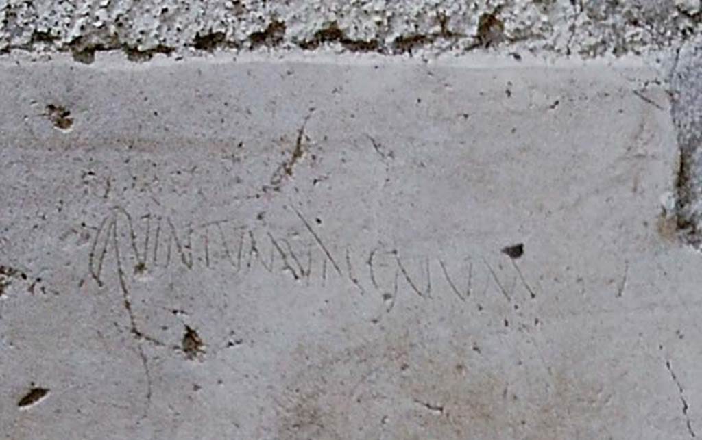 I.13.9 Pompeii. 1966. Inscription from plaster further to south (left) of doorway. 
Detail from photo J66f0274 by Stanley A. Jashemski.  
According to Epigraphik-Datenbank Clauss/Slaby (See www.manfredclauss.de) this read

Quintum Valerium       [CIL IV 10072a]
See Varone A., 2012. Titulorum Graphio Exaratorum Qui In C.I.L. Vol. IV Collecti Sunt Imagines: Studi SAP 31. Roma: LErma di Bretschneider, p. 87.
