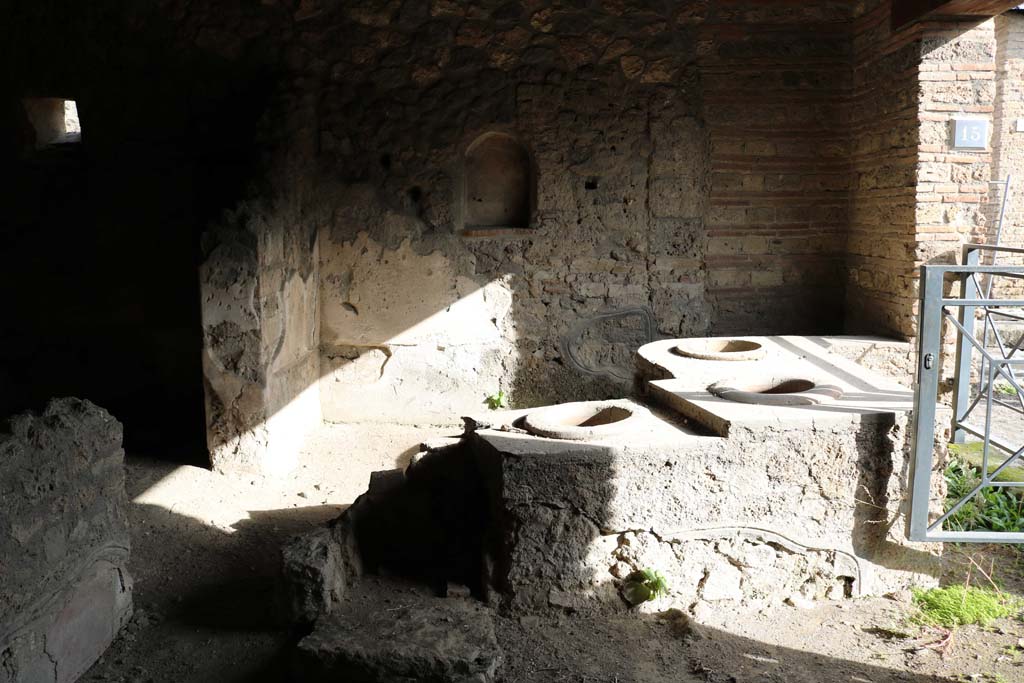 I.14.15 Pompeii. December 2018. Looking east towards counter, and east wall with niche. Photo courtesy of Aude Durand. 