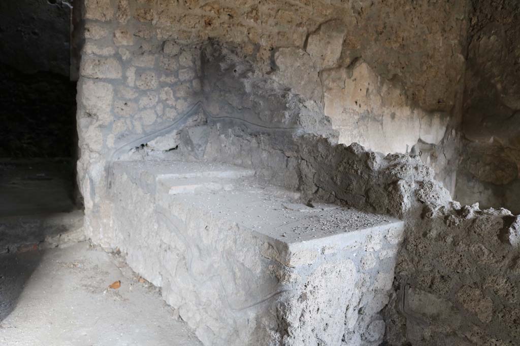 I.14.15 Pompeii. December 2018. Feature on east side of doorway to room on north side. Photo courtesy of Aude Durand.