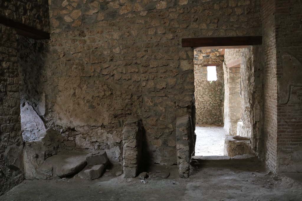 I.14.15 Pompeii. December 2018. Looking towards south wall and doorway to bar-room, on right. Photo courtesy of Aude Durand.

