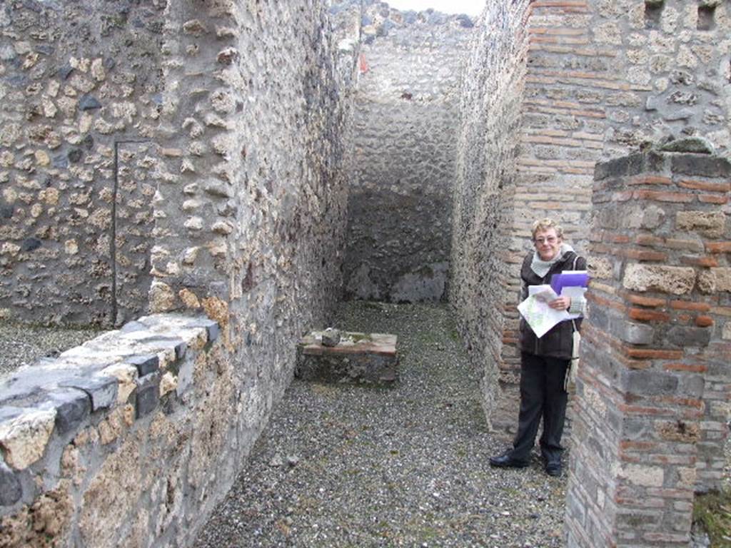 I.16.4 Pompeii. December 2006.Looking east along corridor leading to stairbase and site of stairs to upper floor.