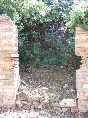 I.19.1 Pompeii. September 2005. Entrance doorway, looking south.
According to Eschebach, this was excavated in 1930. See Eschebach, L., 1993. Gebäudeverzeichnis und Stadtplan der antiken Stadt Pompeji. Köln: Böhlau.(p.79)