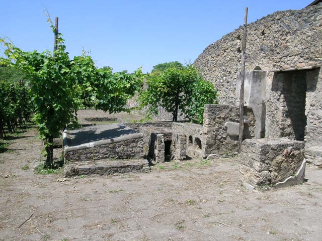 I.20.1 Pompeii. December 2006. Lararium altar in north-east corner.