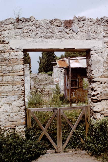 II.1.9 Pompeii. March 2009. Looking north into small room in north-west corner of courtyard garden. Latrine?