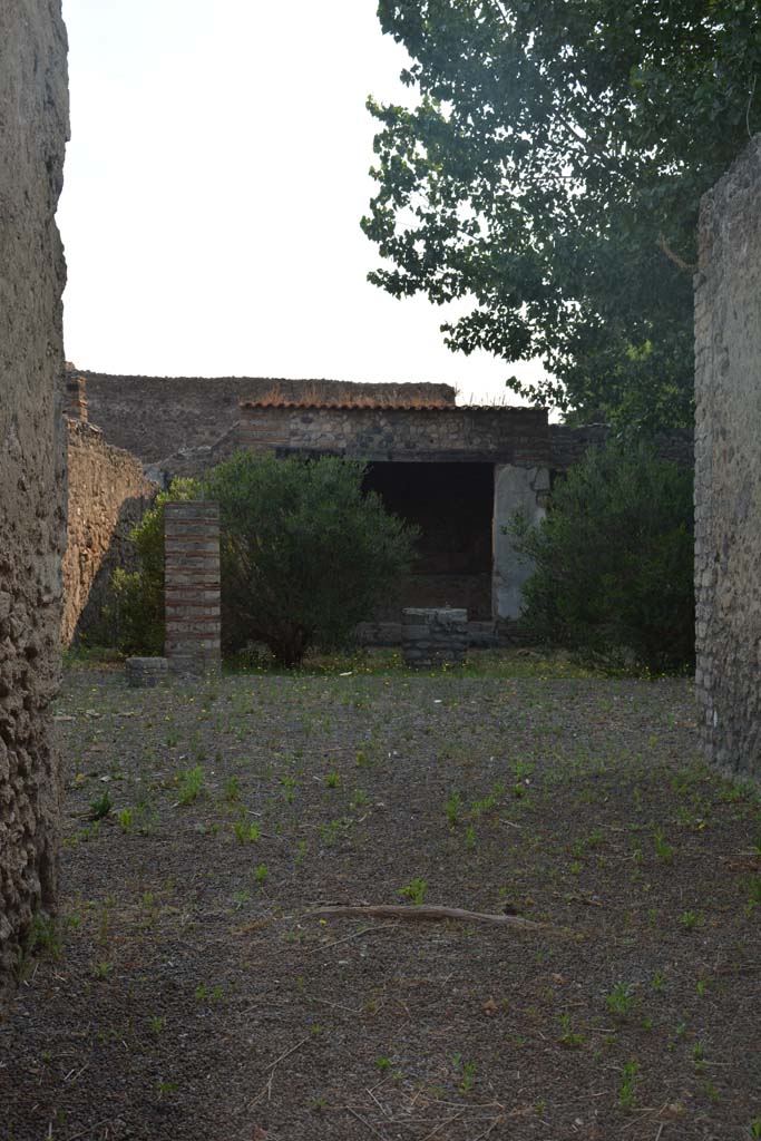 II.1.12 Pompeii. July 2017. 
Looking east from entrance doorway towards wide west doorway of sacellum/oecus.
Foto Annette Haug, ERC Grant 681269 DCOR.
