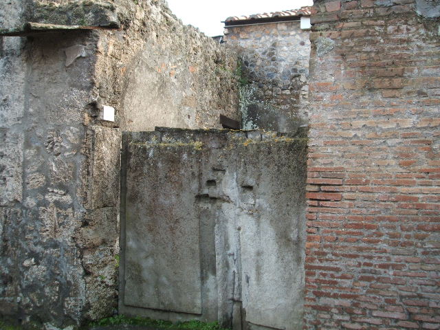 II.3.2 Pompeii. March 2009.  West wall of workshop, site of stairs to upper floor.