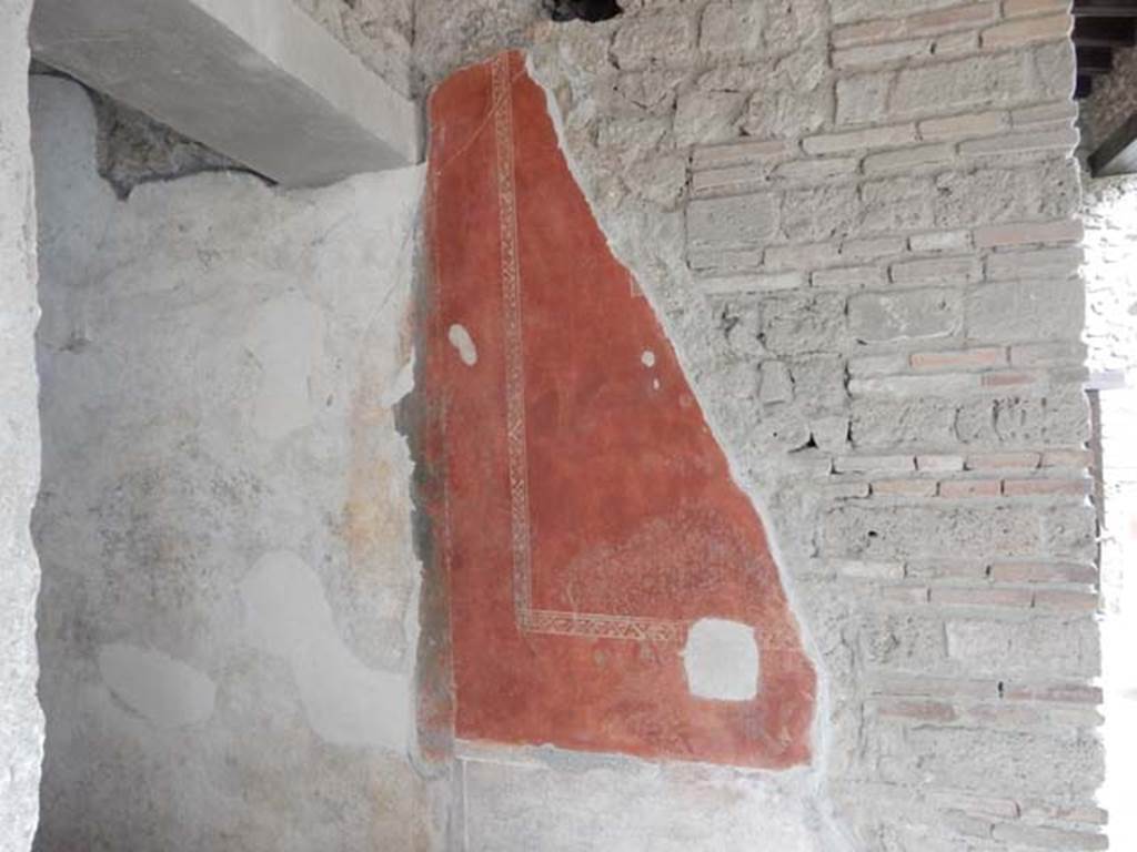 II.3.3 Pompeii. May 2016. 
Detail of painted south wall in north-east corner of room 11, near doorway to room 8.
Photo courtesy of Buzz Ferebee.

