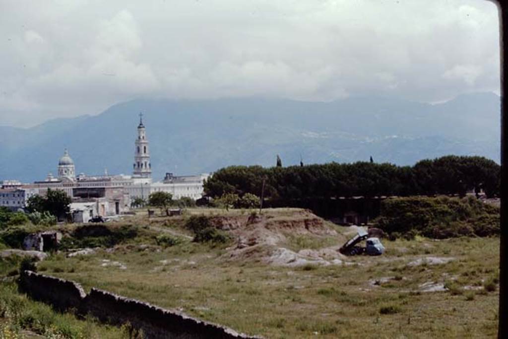 II.5 Pompeii, 1968. Looking south-east from above Via dellAbbondanza, across site of vineyard at II.5. Photo by Stanley A. Jashemski.
Source: The Wilhelmina and Stanley A. Jashemski archive in the University of Maryland Library, Special Collections (See collection page) and made available under the Creative Commons Attribution-Non Commercial License v.4. See Licence and use details.
J68f0121
