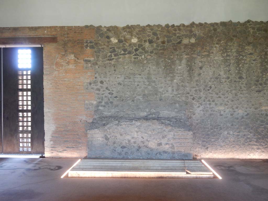 II.7 Pompeii. June 2019. Looking towards altar against west wall, and doorway at II.7.9a leading west.
Photo courtesy of Buzz Ferebee.
