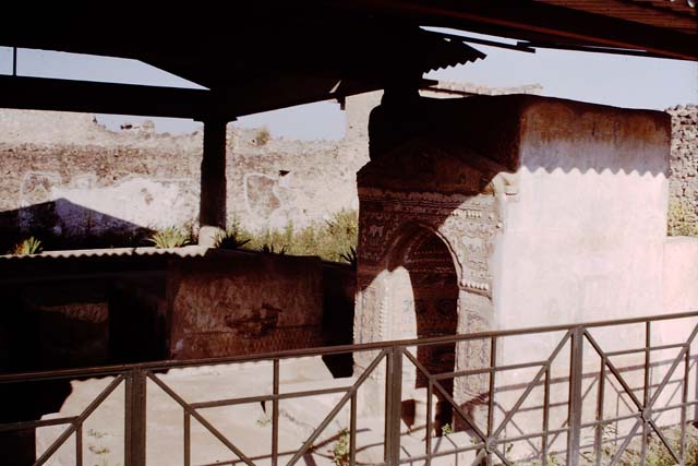 II.9.7. Garden entrance to House of Summer Triclinium.  December 2007.  West face of north fountain.  Painted trellis work pattern.