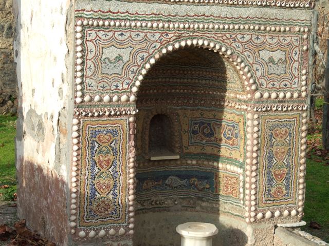 II.9.7. Garden entrance to House of Summer Triclinium.  December 2007.  Fountain or Nymphaeum on the south side.  North face.