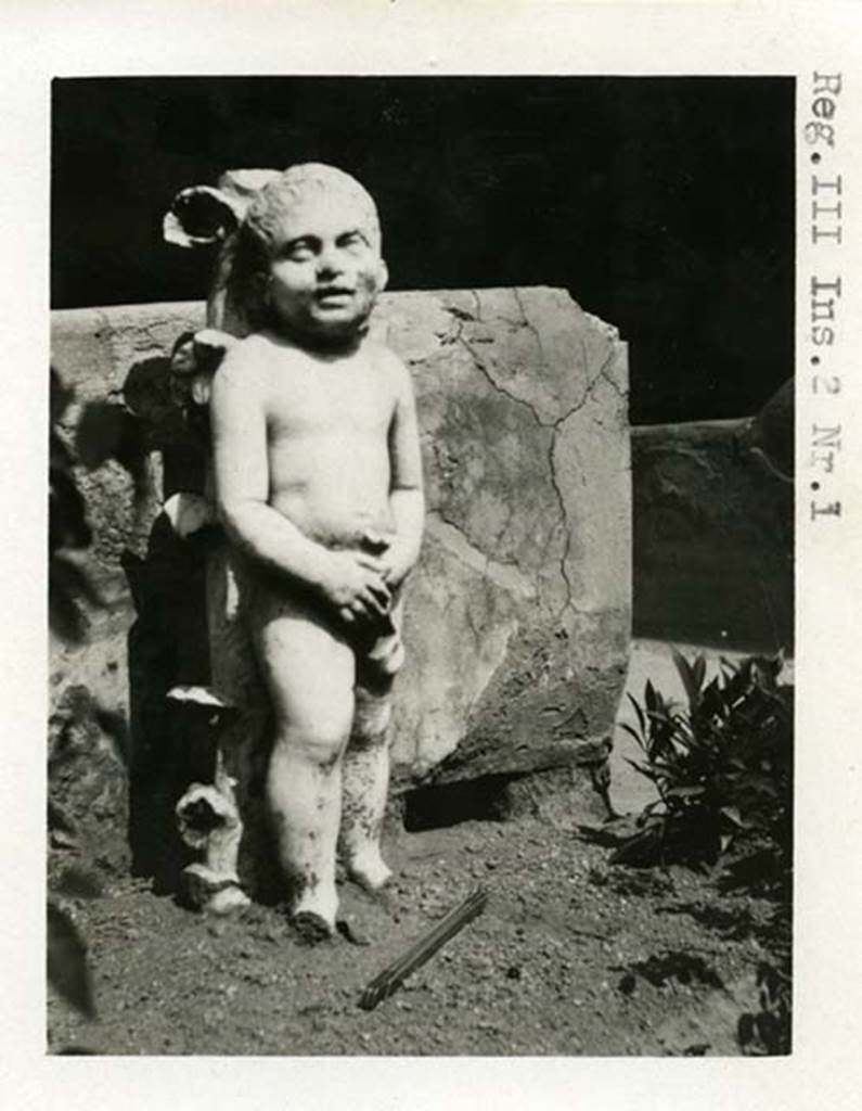 III.2.1 Pompeii. 1937-39. Room 20, statue of cupid. Photo courtesy of American Academy in Rome, Photographic Archive. Warsher collection no. 1920a
