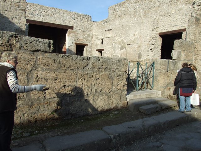 III.2.1 Pompeii.  December 2005.  Rooms on east side of atrium.  Before restoration.   