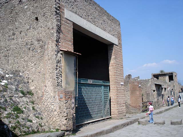 III.3.6 Pompeii. Old postcard, the date of the photograph is unknown. The post stamp is illegible.  The author of message however dates the card as 19th September 1933. Photo courtesy of Drew Baker.
According to Varone and Stefani, on the pilaster to the west of the doorway, on the left of the photo, were found – CIL IV 7654, 7655 and 7656, see below. Under the trophy wall painting on the west side of the doorway was CIL IV 7657, see below. Under the trophy wall painting on the east side of the doorway were CIL IV 7658, 7659 and 7660, see below. None of these have been conserved. See Varone, A. and Stefani, G., 2009. Titulorum Pictorum Pompeianorum, Rome: L’erma di Bretschneider, (p.246-251 with photos).
On the east (on the right) doorpost and on the exterior wall in the neighbouring vicolo, Della Corte also mentions CIL IV 7665 and 7666. Under CIL IV 7666, he quoted another CIL IV 8841. See Della Corte, M., 1965.  Case ed Abitanti di Pompei. Napoli: Fausto Fiorentino. p.351-355.
See Varone, A., 2002. Erotica Pompeiana: Love Inscriptions on the Walls of Pompeii, Rome: L’erma di Bretschneider. (p.138, for description of CIL IV 8841).
According to Epigraphik-Datenbank Clauss/Slaby (See www.manfredclauss.de) these CIL IV’s read as -
L(ucium)  C(aecilium)  C(apellam)  d(ignum)  o(ro) v(os)  f(aciatis)      [CIL IV 7654]
L(ucium)  Popidium 
aed(ilem)  o(ro)  v(os)  f(aciatis)       [CIL IV 7655]
Popidium 
IIv[ir(um)  v(irum)]  b(onum)      [CIL IV 7656]
Popidium 
aedilem  v(iis)  a(edibus)  s(acris)  p(ublicis)  p(rocurandis)  d(ignum)  r(ei)  p(ublicae)  populus 
facit  et  rogat        [CIL IV 7657]
L(ucium)  Ceium  Secundum  IIvir(um) 
Scymnis  nec  sine  Trebio 
/ 
Infantio  scr(ipsit)       [CIL IV 7658]
Cn(aeum)  Helvium  Sabinum  aed(ilem)  o(ro)  v(os)  f(aciatis)       [CIL IV 7659]
A(ulum)  Suettium  Certum 
A(ulum)  Suettium  [Verum] 
o(ro)  v(os)  f(aciatis)       [CIL IV 7660]
L(ucium)  Popidium  L(uci)  f(ilium)  Ampliatum 
aed(ilem)  d(ignum)  r(ei)  p(ublicae)  coloniae  Pompeianae  o(ro)  v(os)  f(aciatis) 
Infanticulus  cum  sodalibus  rog(at)       [CIL IV 7665]
Epidium  Sabinum  aed(ilem) 
v(iis)  aed(ibus)  s(acris)  p(ublicis)  p(rocurandis)  o(ro)  v(os)  f(aciatis)  q(uaestor?)  Martialis      [CIL IV 7666]
Martialis  fellas  Proculum       [CIL IV 8841]

