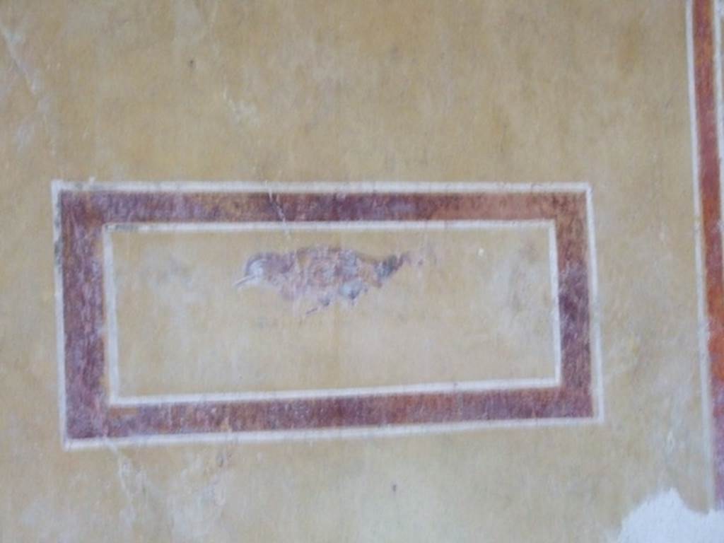 III.4.b Pompeii. March 2009. Room 5, panel in west wall of triclinium with remains of painted bird.