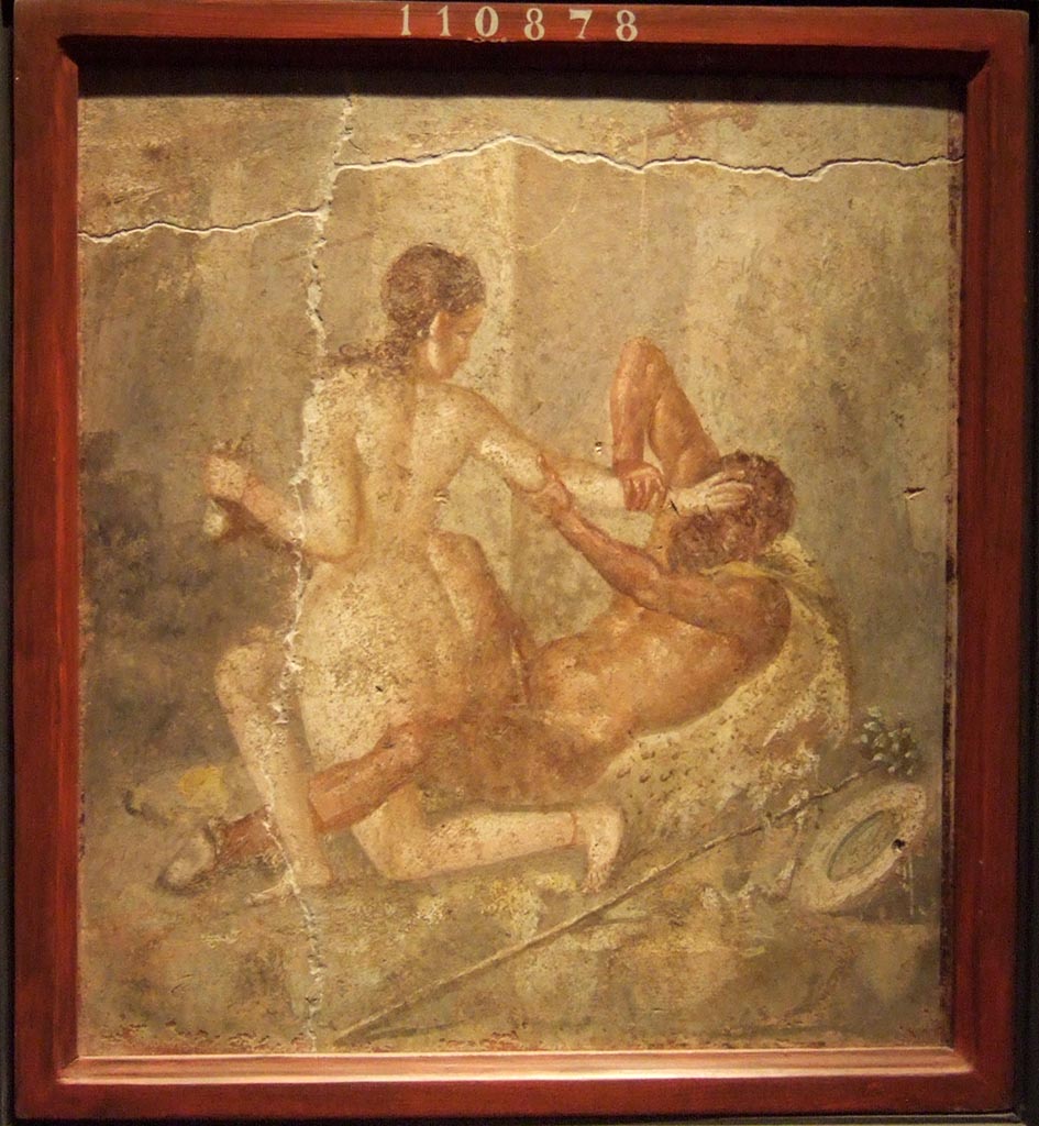 V.1.18 Pompeii. Wall painting of a lying down Satyr and a Bacchante trying to free herself from him, found on the north wall of Room “l” (L).  
Now in Naples Archaeological Museum. Inventory number 110878.
