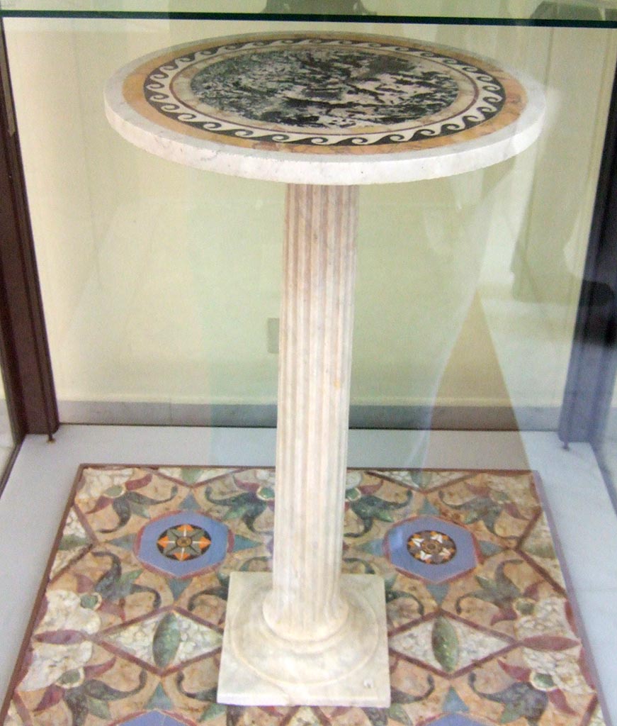 Marble table found in V.1.18 Pompeii. 
Now in Naples Archaeological Museum. Inventory number 120830.
