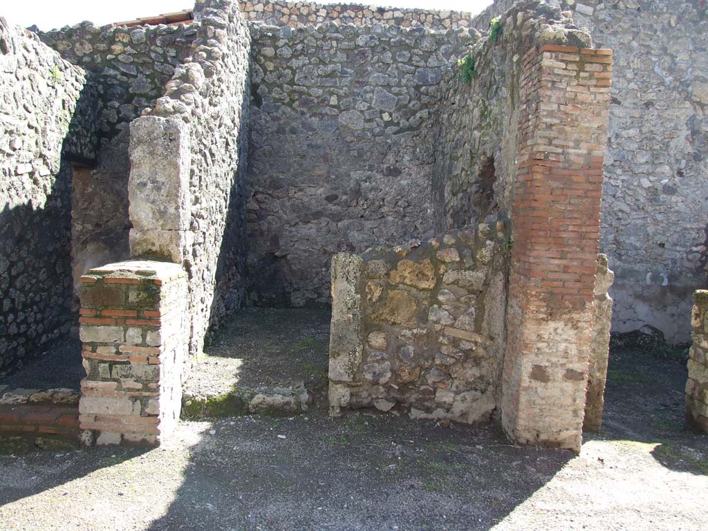 V.1.23 Pompeii. March 2009. Room 19, brick structure in south-west corner.