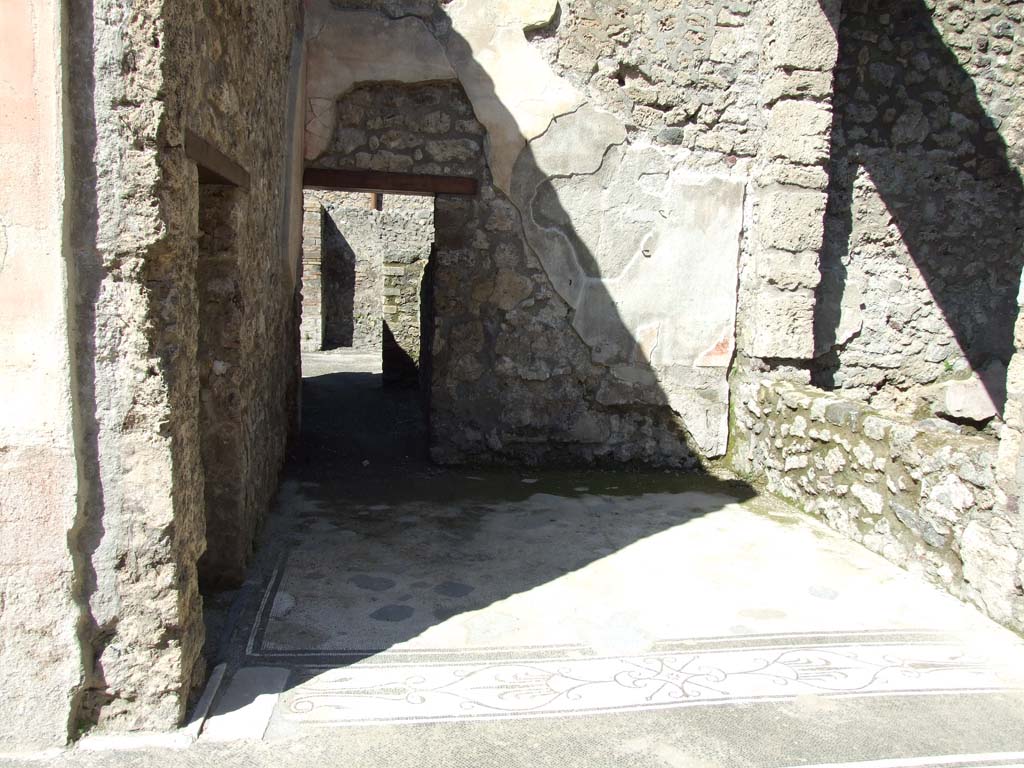 V.1.26 Pompeii. March 2009. Room “e”, ala on north side of atrium, with passageway to V.1.23 in north wall.