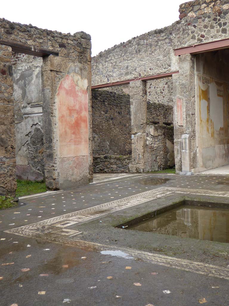 V.1.26 Pompeii. October 2020. Room 1, atrium. Looking north-east to rooms, 2, 3 and 4. 
The remains of the base for the money chest are between the two cubicula, rooms 2 and 3. Photo courtesy of Klaus Heese.
