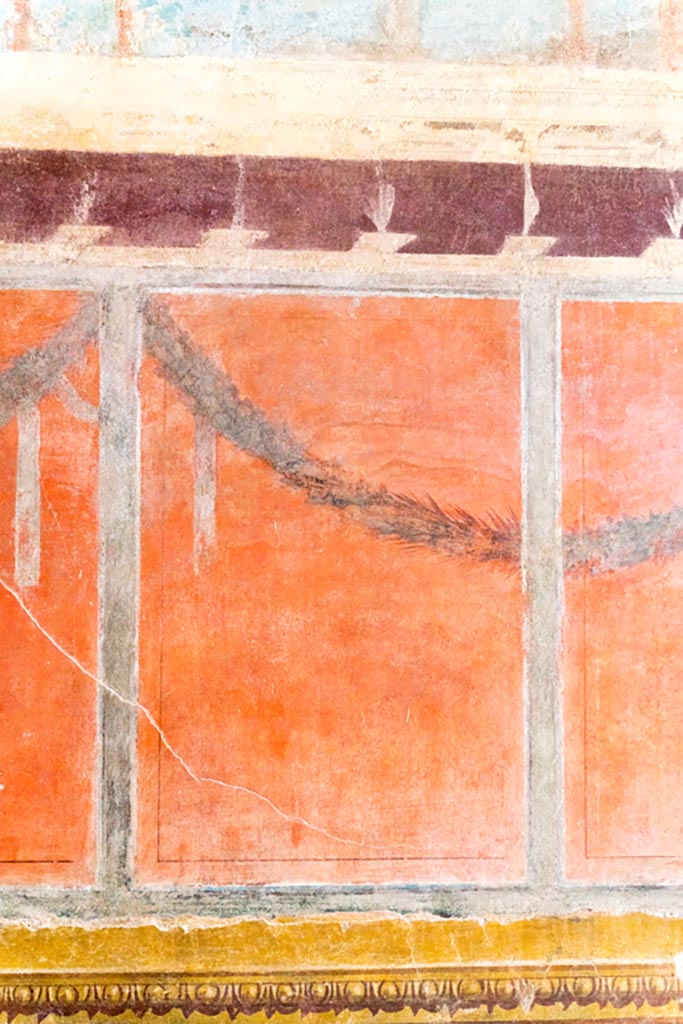 V.2.i Pompeii. March 2023. 
Room 21, Corinthian oecus, detail of painted panel on south wall. Photo courtesy of Johannes Eber.
