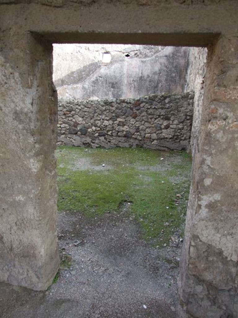 VI.1.7 Pompeii. December 2007. Doorway to room 23 from east portico, looking west towards room 22.