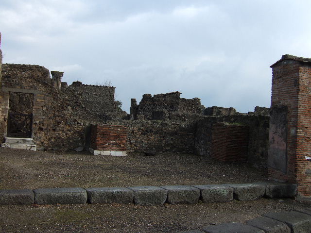 VI.1.13 Pompeii. May 2010. Looking east across rooms at rear, in VI.1.22